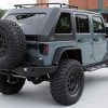 custom-2015-jeep-wrangler-jku-anvil-metalcloak-wildboar-aev-pass-rear-three-quarter Set overfendere aripi ALUMINIU Jeep Wrangler JK 2007-2017